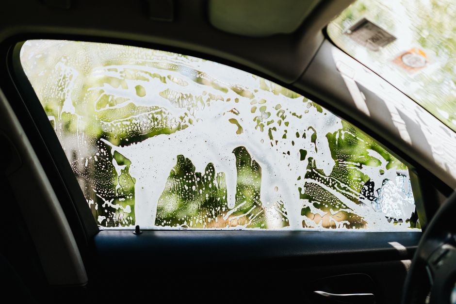 Rich foaming soap applied during a premium car wash